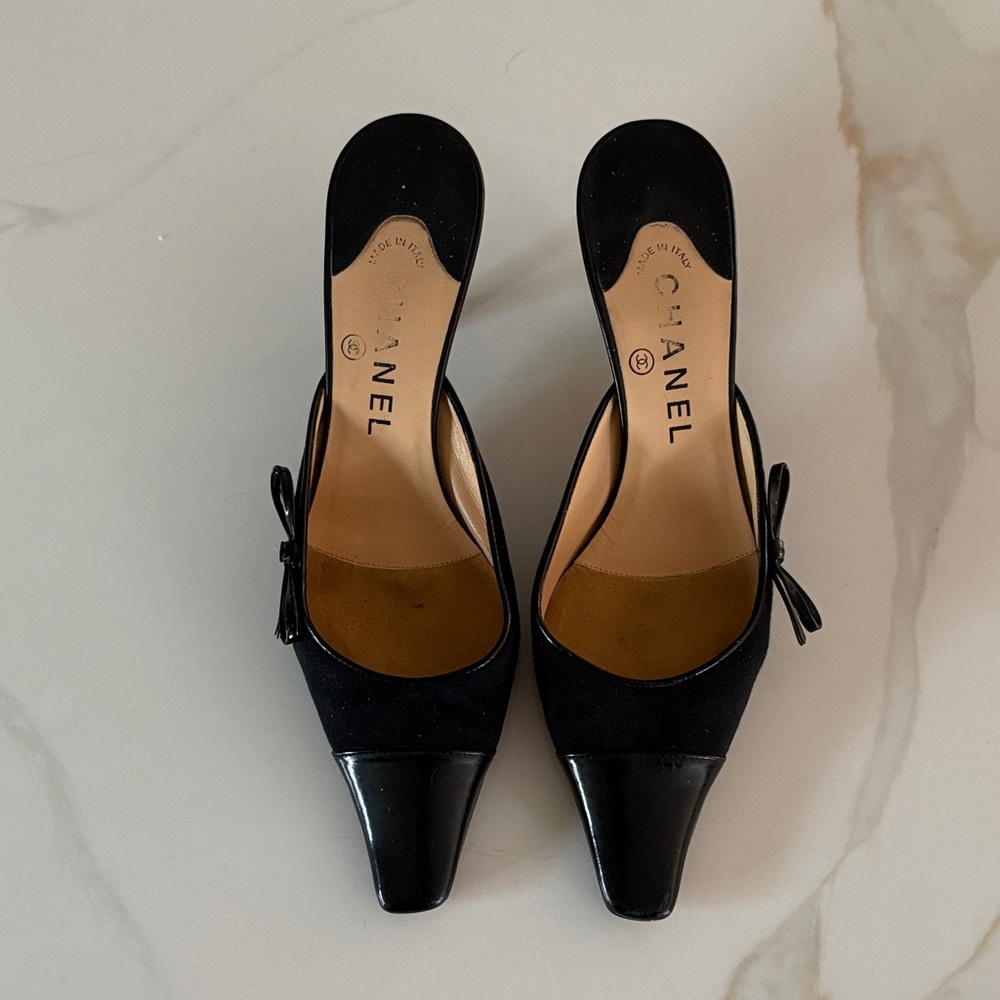 CHANEL Black Mules with Bow Accent